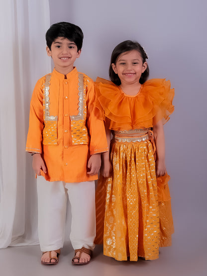 Orange organza frill chanderi lehnga set