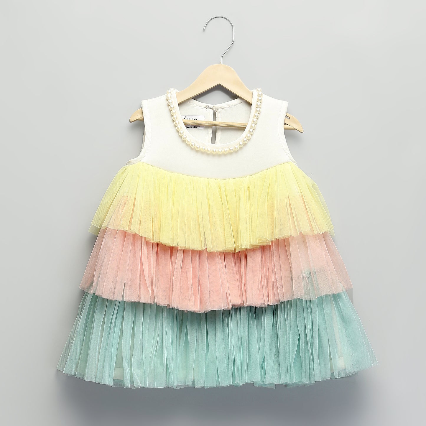 WHITE DRESS  WITH PASTEL COLOR RUFFLED DRESS