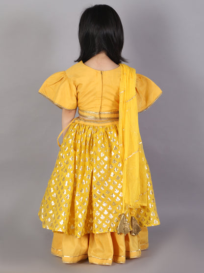 Mustard Blouse with attached net Dupatta and double layered lehnga