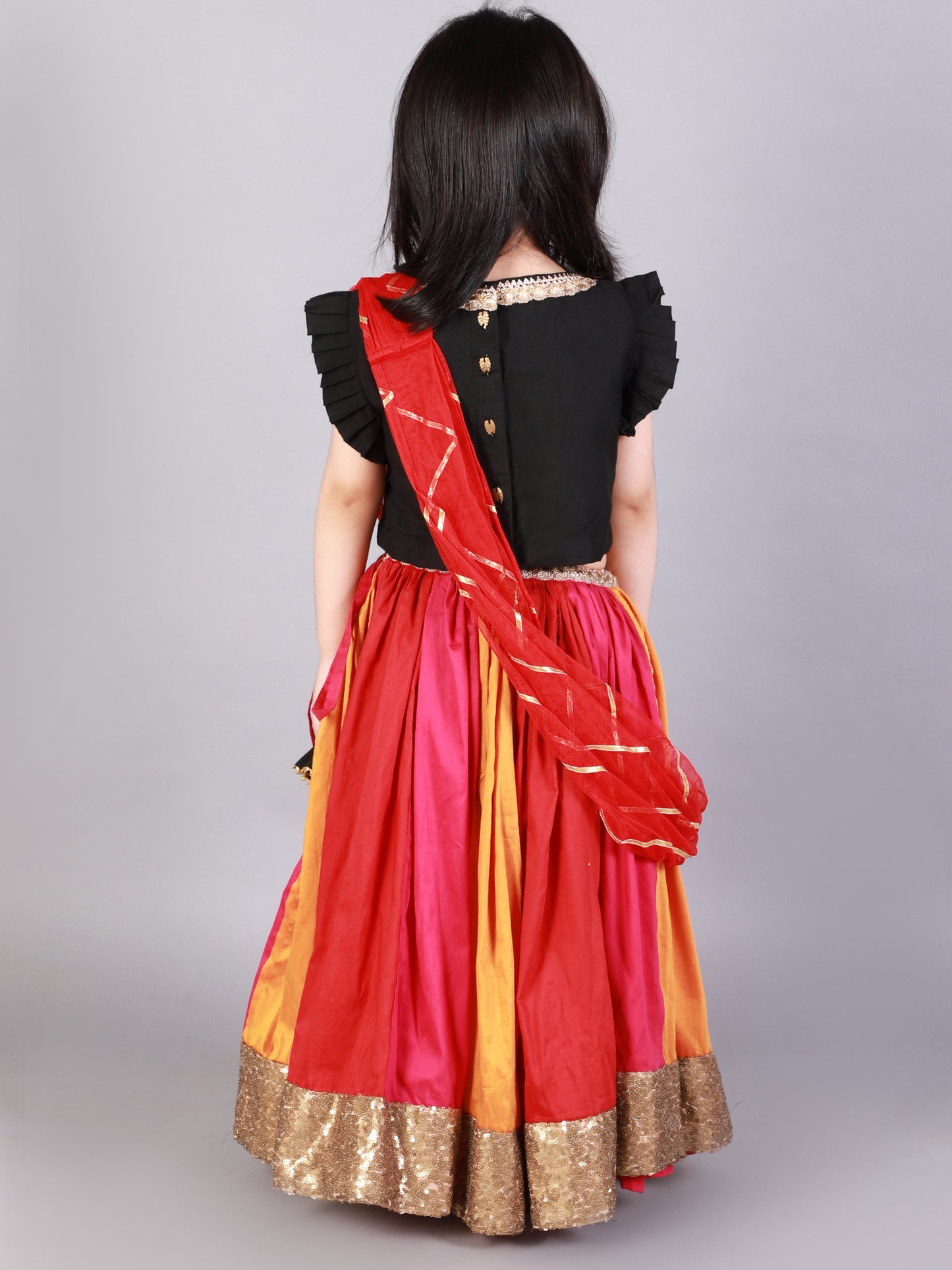 Black Ruffled blouse with multi color lehnga