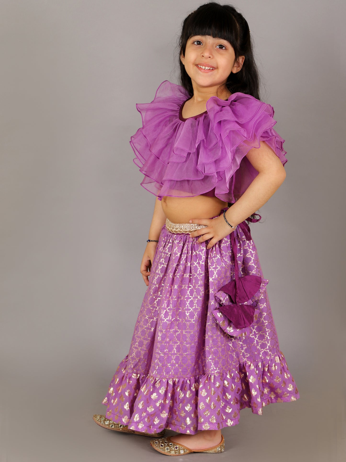 Purple organza frilled blouse with cotton zari lehnga