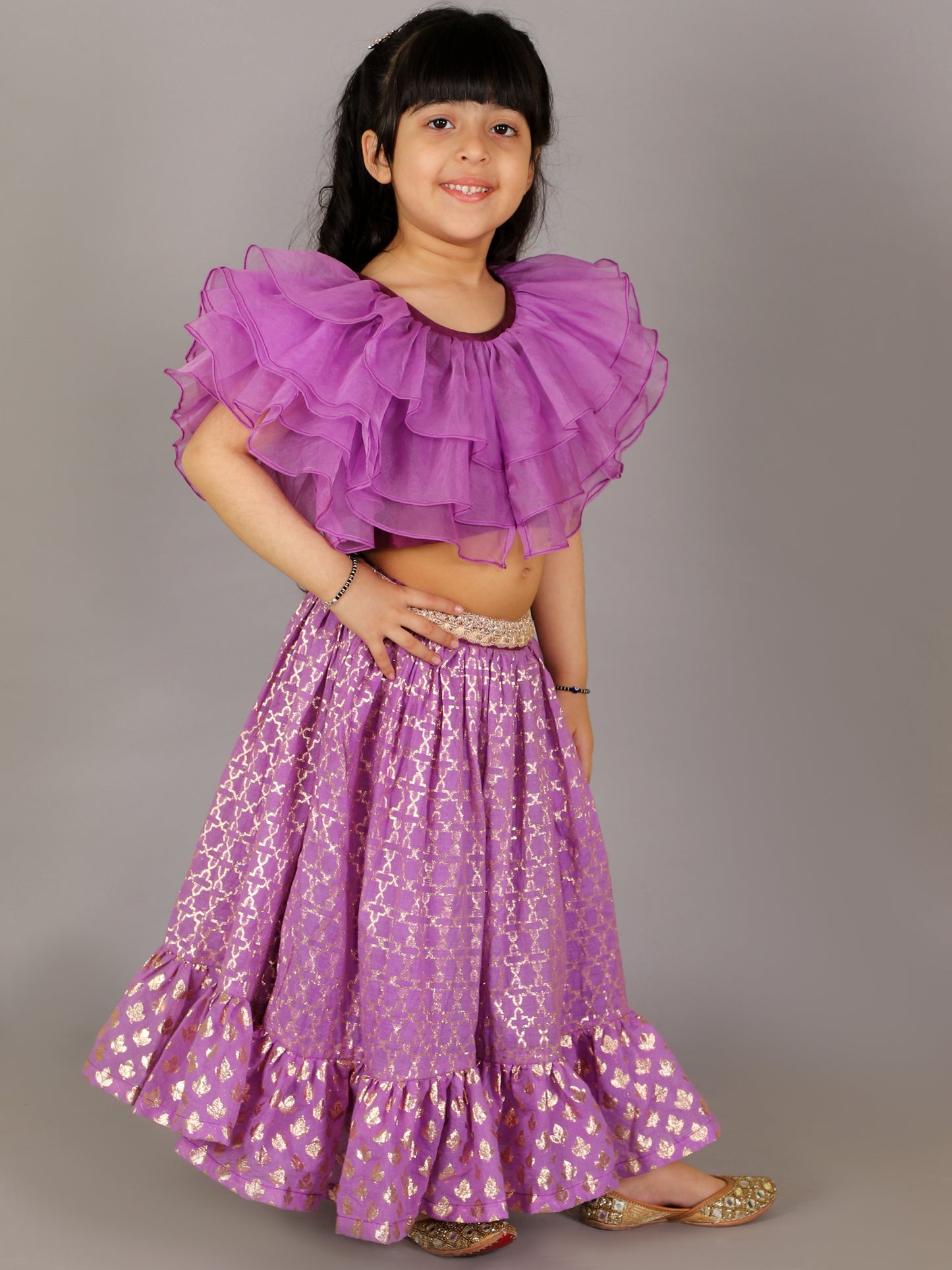 Purple organza frilled blouse with cotton zari lehnga