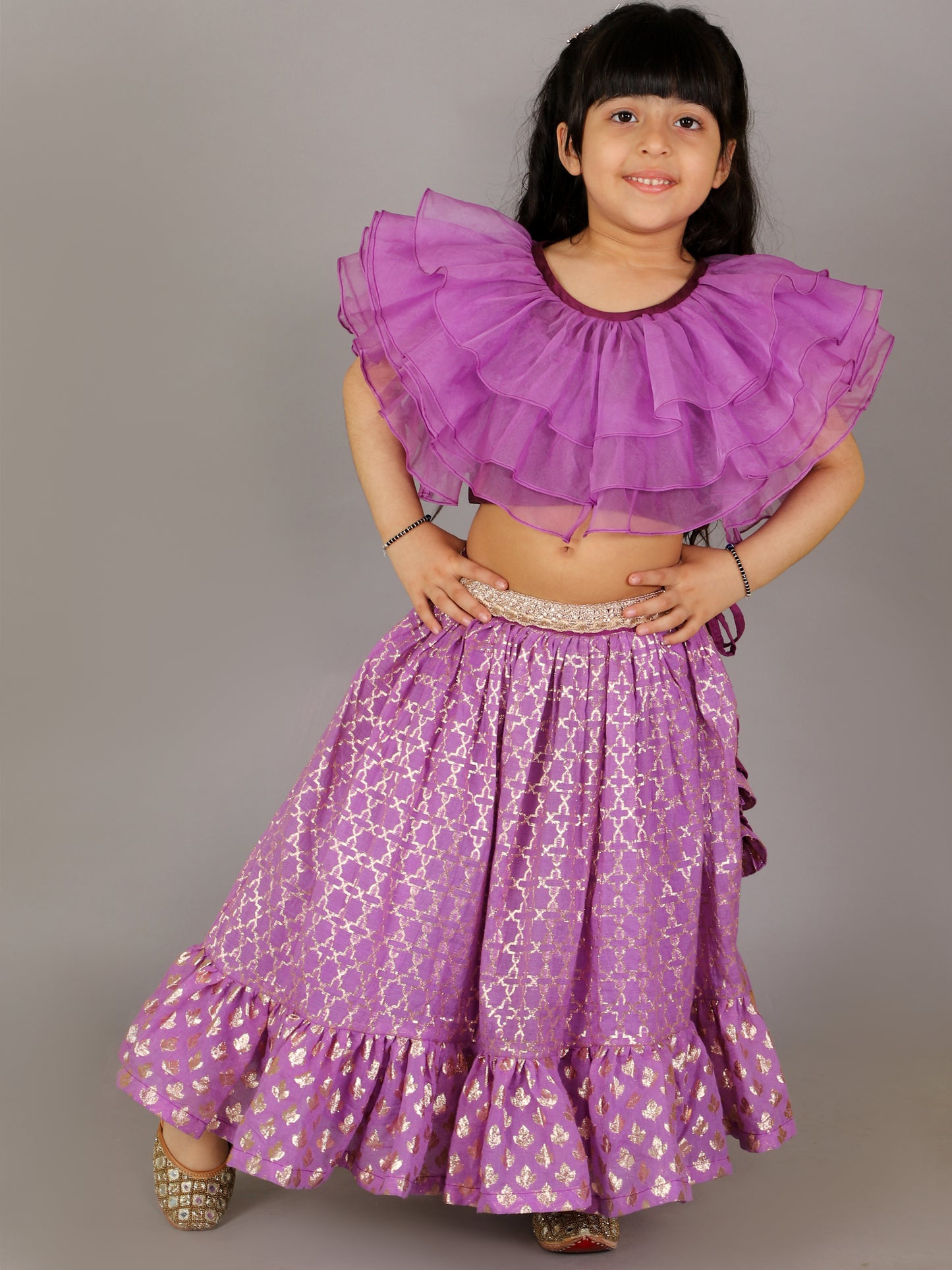 Purple organza frilled blouse with cotton zari lehnga