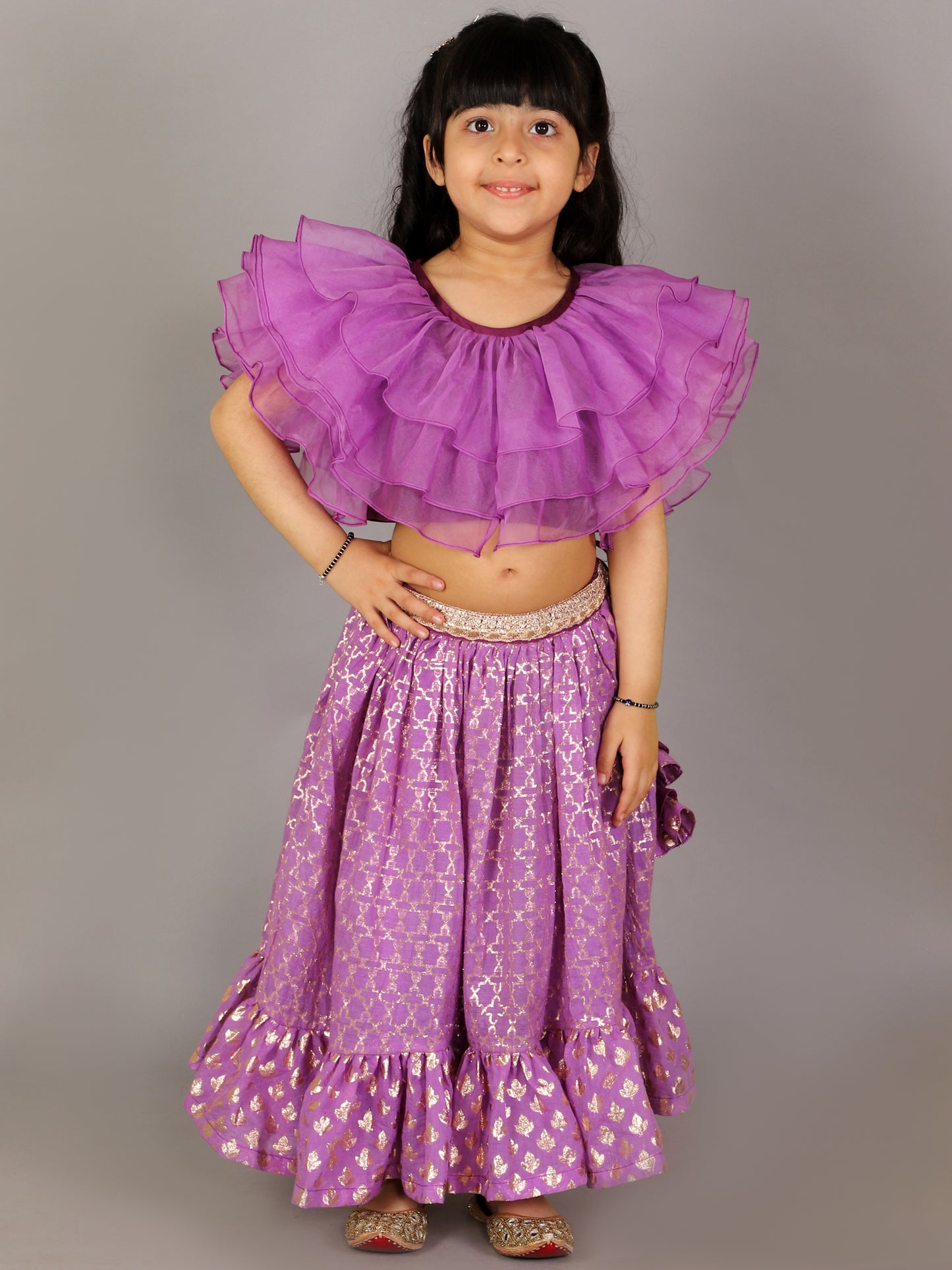 Purple organza frilled blouse with cotton zari lehnga