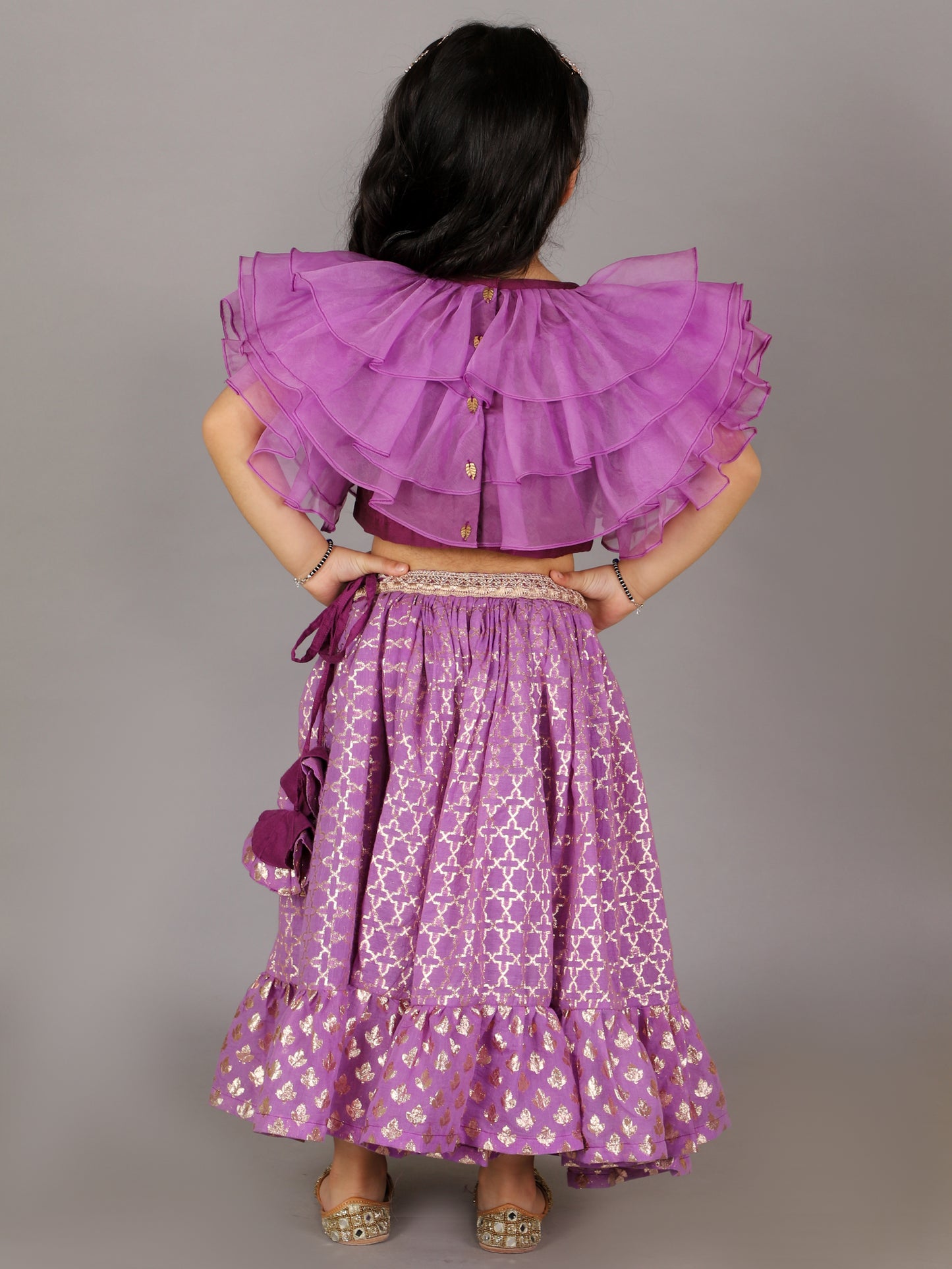 Purple organza frilled blouse with cotton zari lehnga