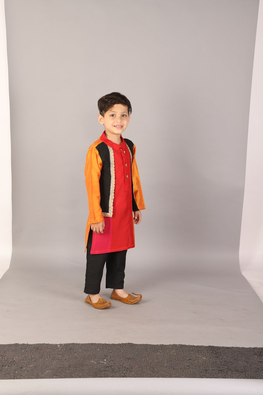 Multi colored kurta with attached black jacket