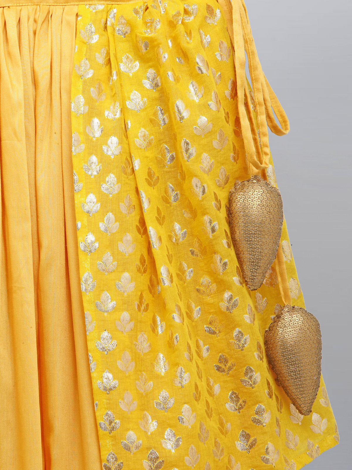 Mustard Blouse with attached net Dupatta and double layered lehnga