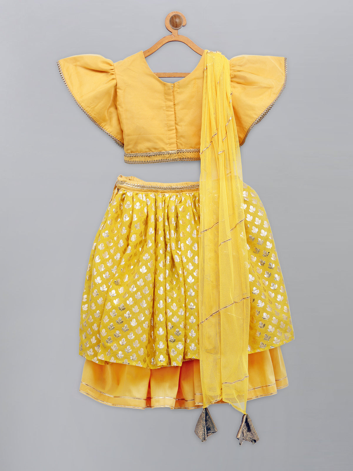 Mustard Blouse with attached net Dupatta and double layered lehnga