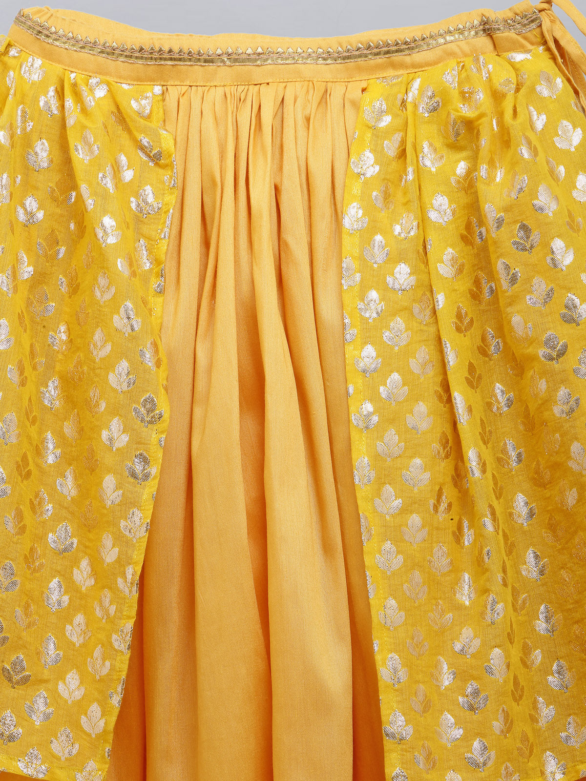 Mustard Blouse with attached net Dupatta and double layered lehnga